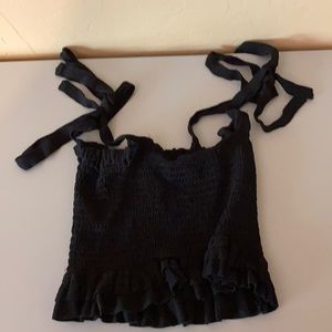 A cropped fitted beach top